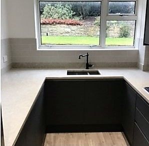 Wren Pencil Satin Infinity Milano Ultra range, Xena Quartz Worktops, Upstands,  Light Grey Oak Vinyl Flooring.  Brick effect tiling.: Swipe To View More Images
