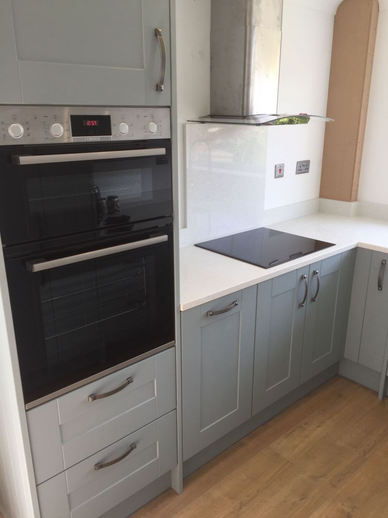 Wren Inifinity Range, Cloud Blue Ermine & Bow Antique Handles, Quartz Artic Starburst worksurfaces and upstands. Bosch built in appliances.: Swipe To View More Images
