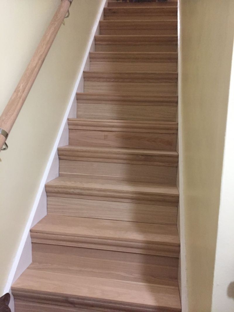 Solid Oak stair conversion system with  oak treads & risers bespoke fit to your existing stairs.  This was a 12 step straight stairs converted from standard carpeted stairs to Oak.: Swipe To View More Images