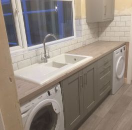 Homebase Timber Grey with Syllabub Laminate Worktop, White brick effect tiling & Manhattan grey grout.: Click Here To View Larger Image
