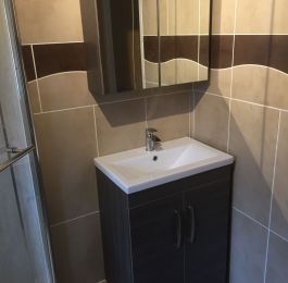 This bathroom was installed in 2012 and we have just recently returned to supply and fit a new vanity unit and wall cabinet in a very nice Brown Grey Avola.  : Click Here To View Larger Image